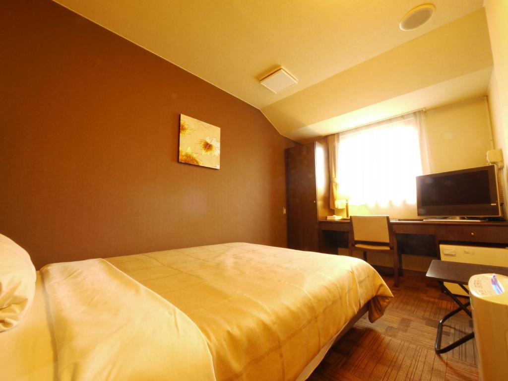Hotel Route-Inn Ageo Quarto foto